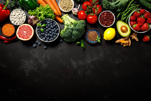 Healthy food. Healthy eating background. Fruit, vegetable, berry.  Vegetarian eating. Superfood - Fotó, kép