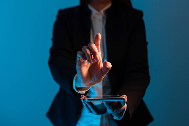 Businesswoman Holding Tablet And Pointing With One Finger On Important News - Foto, afbeelding