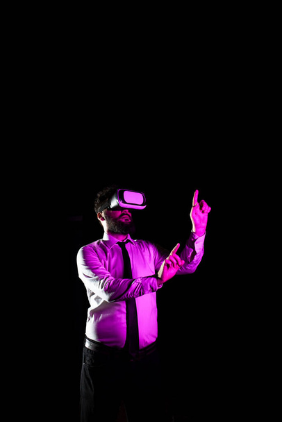 Businessman Using Virtual Reality Simulator And Gesturing During Training. - Foto, immagini