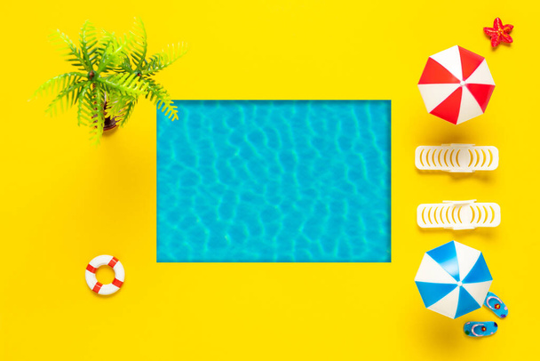 Summer scene with swimming pool, sun umbrella and sunbed. Minimal summer holiday concept background. Tropical party top view. - Fotoğraf, Görsel