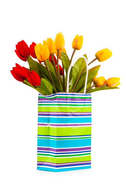 Tulips in the bag isolated on white - Foto, Bild