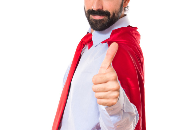 Empresario vestido como superhéroe con el pulgar hacia arriba
  - Foto, Imagen