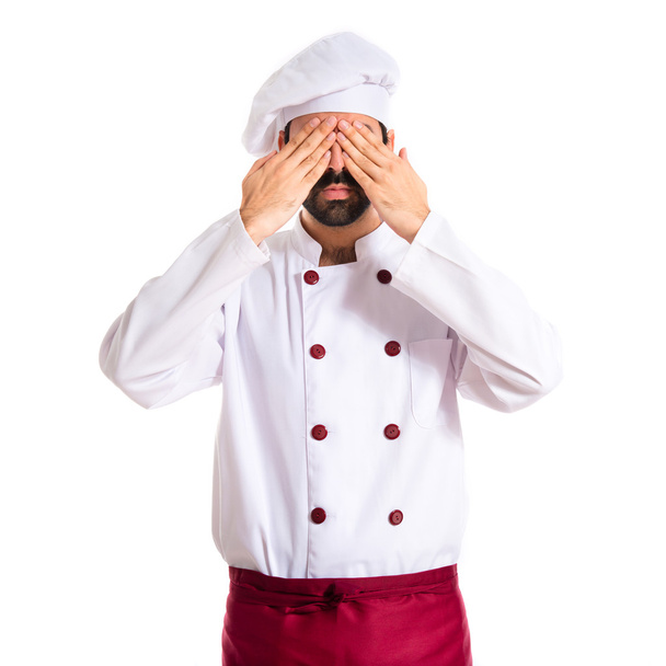 Chef cobrindo seus olhos sobre fundo branco
 - Foto, Imagem