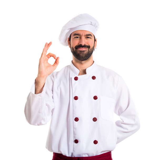 Koch macht ok Zeichen über weißem Hintergrund - Foto, Bild