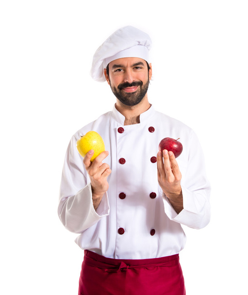 Chef holding apples - Фото, зображення