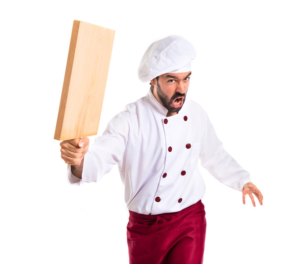 Šéfkuchař útočí s kuchyňské nástroje - Fotografie, Obrázek