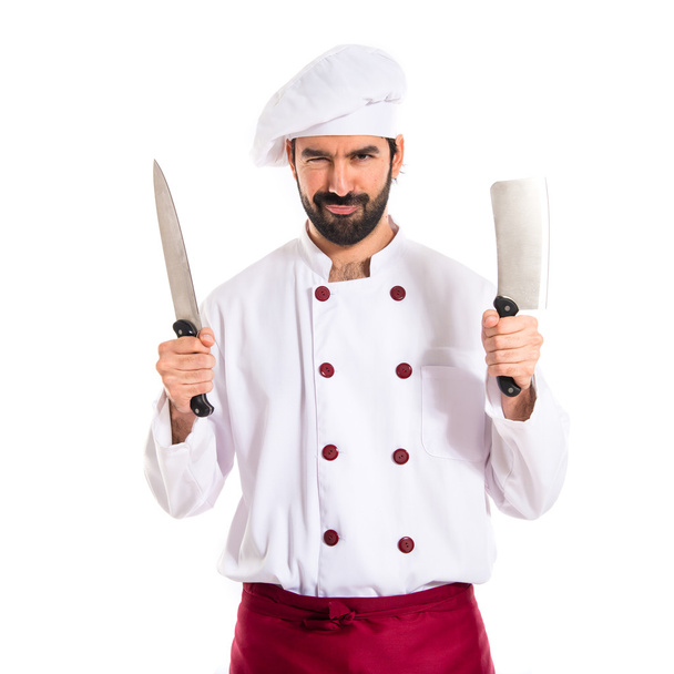 Chef sosteniendo cuchillos
 - Foto, imagen
