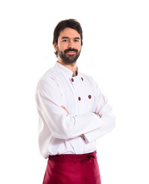 Chef com os braços cruzados sobre fundo branco
 - Foto, Imagem