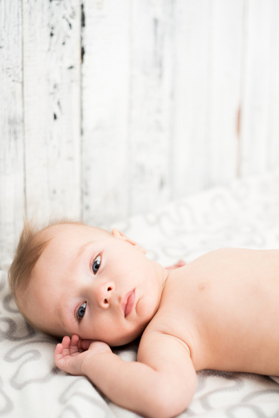 Baby boy lying on the cozy cloth - Photo, Image