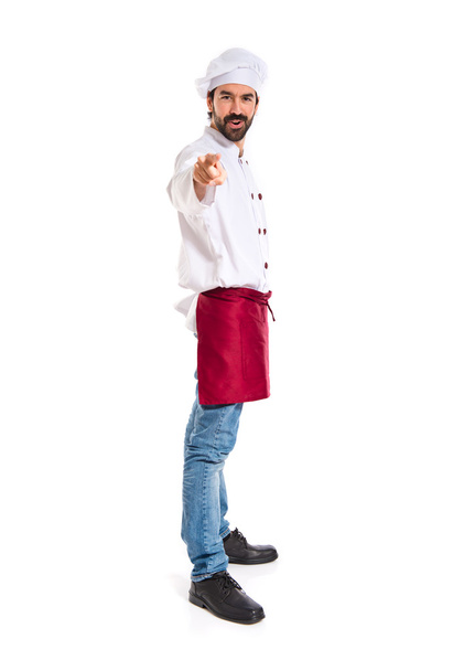 Chef pointing to the front over white background - Photo, Image