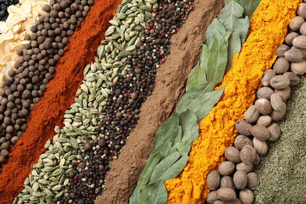 Set of different spices as background, top view - Φωτογραφία, εικόνα