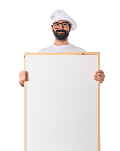 Chef feliz segurando cartaz vazio
 - Foto, Imagem