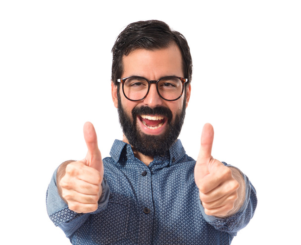 Young hipster man with thumb up - Photo, Image