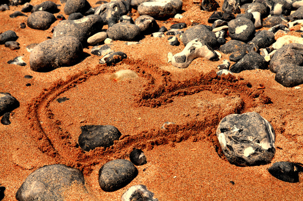 Ranta hiekalla ja pikkukivillä, Englanti
 - Valokuva, kuva