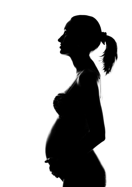 Silhouette of pregnant woman - Photo, Image