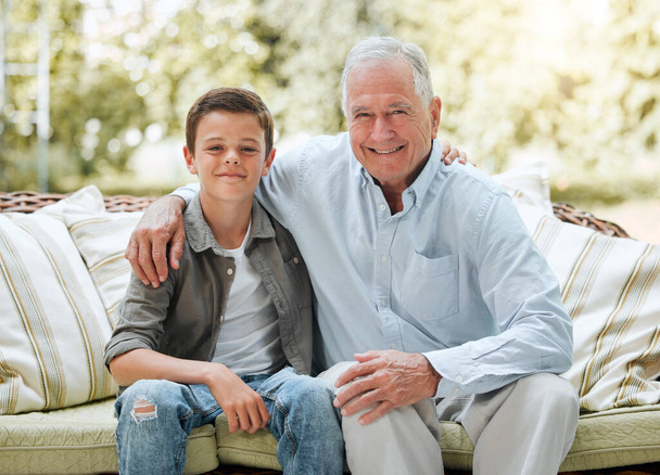 Hes my main man. a senior man sitting outside with his grandson - Φωτογραφία, εικόνα