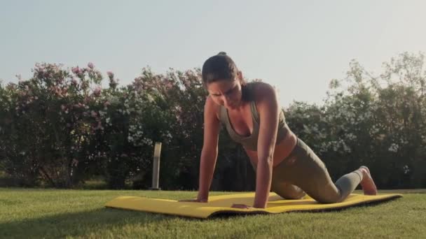 Woman have tired during yoga exersize in park, feels bad and broken, health concept. slowmotion - Filmmaterial, Video