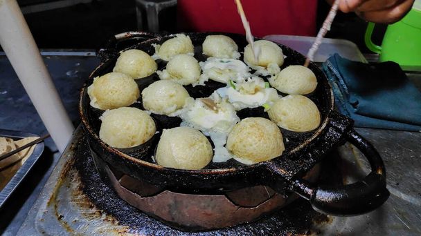 Process to cooking takoyaki most popular delicious snack at traditional night market - Φωτογραφία, εικόνα