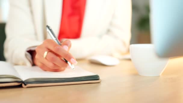 Businessperson writing down information in book at office. Professional and clean workspace indoors they might have the job of a doctor, researcher or journalist. They are focused on work and sharp. - Filmmaterial, Video