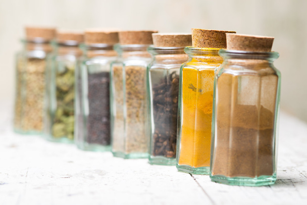 Idian spices in a glass jars isolated - Valokuva, kuva