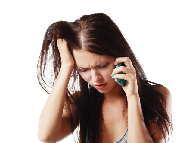 Worried woman talking on the phone - Fotó, kép