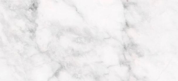 Λευκό μάρμαρο. λευκό κομψό μάρμαρο με σαφείς γραμμές. λευκό κεραμικό πλακάκι. λευκό μαρμάρινο κεραμικό πλακίδιο. μαρμάρινη πέτρα με γκρι φλέβες. Μάρμαρο γρανίτη φυσικό μάρμαρο. - Φωτογραφία, εικόνα