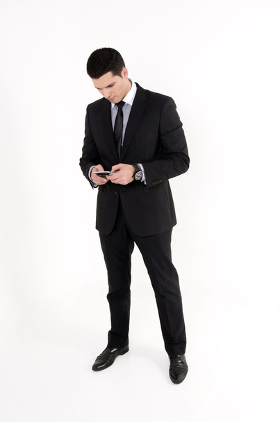 Businessman with cellular phone - Фото, изображение
