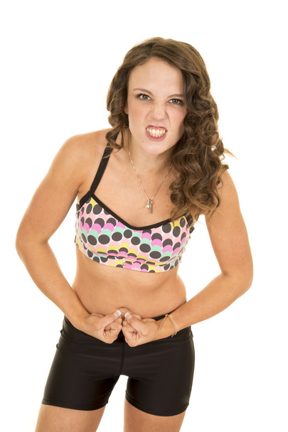 Woman  flexing wearing sport bra - Фото, изображение