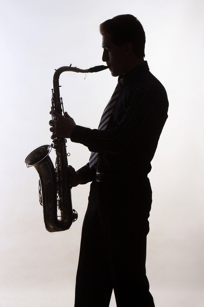 Saxophone player silhouette - Foto, afbeelding