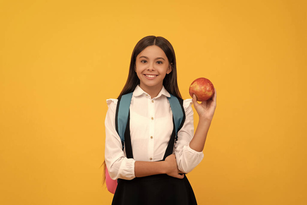 Going back-to-school. Happy child smile holding apple. Back-to-school. September 1. Knowledge day. Formal education. Welcome back to school. - Фото, зображення