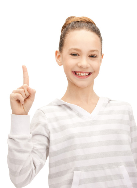 Teenage girl with her finger up - Foto, Imagen