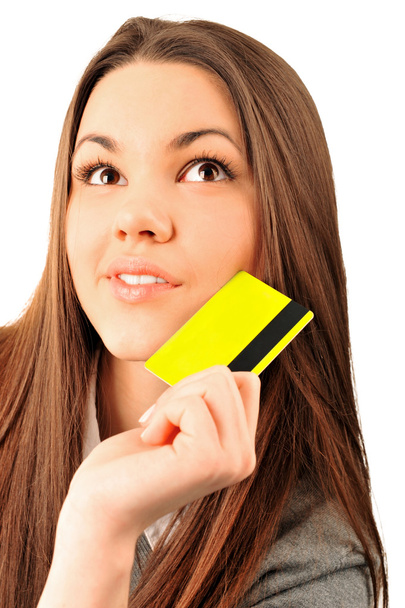 Happy blond woman showing blank credit card - Фото, изображение