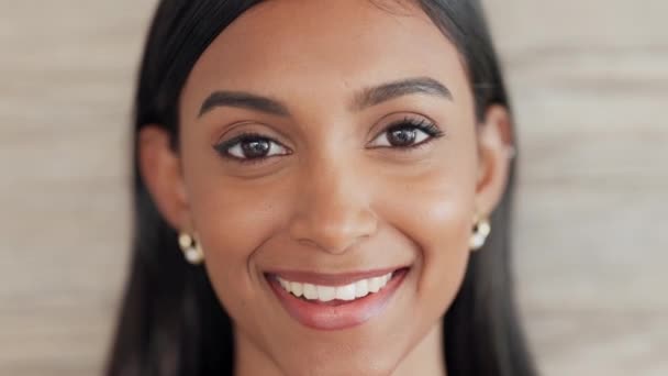 Closeup portrait of a happy and confident female smiling with perfect teeth due to oral and dental hygiene. Face of a beautiful student or intern feeling excited, in a good mood and ready for success. - Кадры, видео