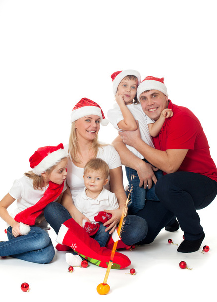 Happy cute family in santa's hats - Zdjęcie, obraz