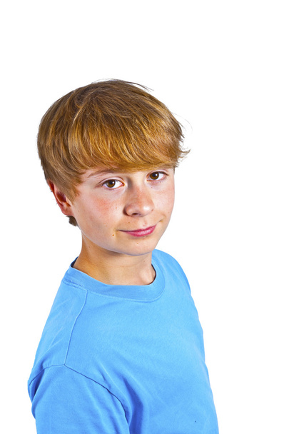 portrait of happy boy with blue shirt in studio - Foto, afbeelding