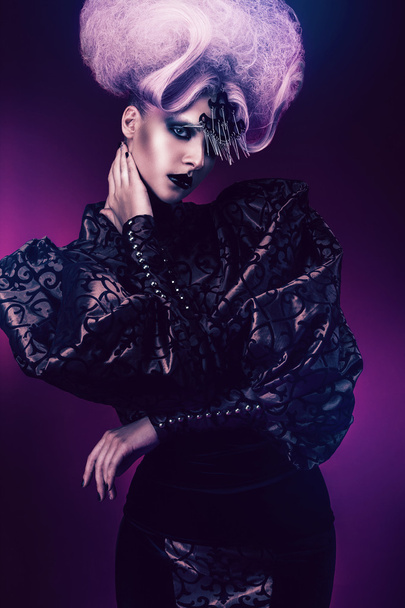 Mystic woman in big violet wig - Фото, зображення