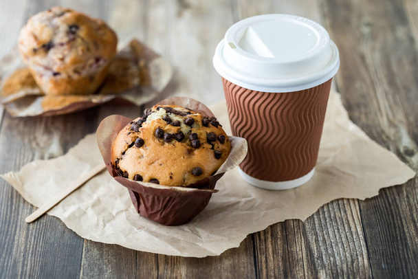 Close up of delicious fresh baked muffins served with coffee, ready for snacking. - 写真・画像