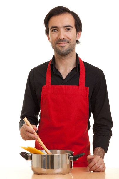 Chef con olla de pasta
 - Foto, Imagen