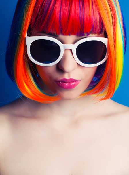 Beautiful woman in colorful wig - 写真・画像