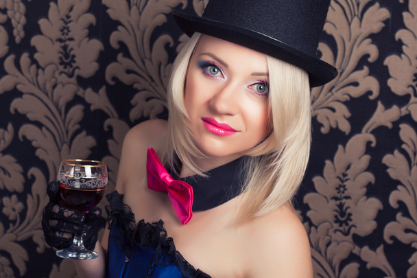 Beautiful woman with glass of red wine - 写真・画像
