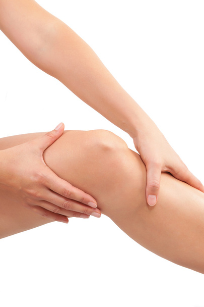 Female knee isolated on white - Foto, imagen