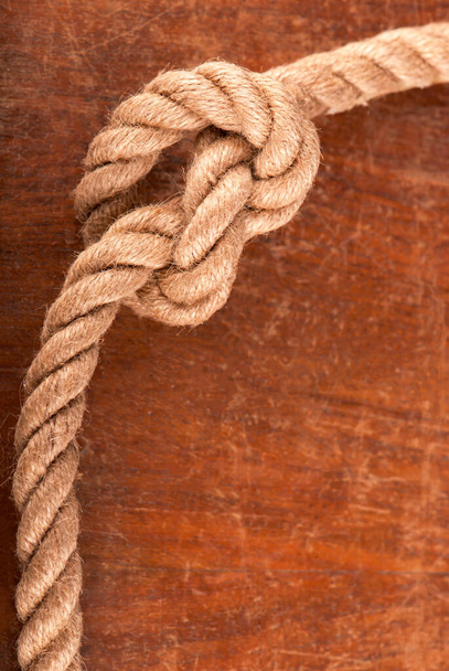 Rope with Reef Knot on Wood Texture - Valokuva, kuva