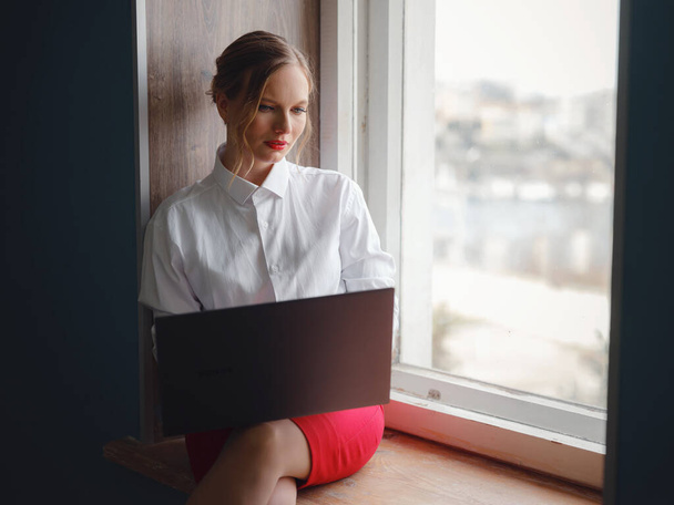 Business woman working in office. Online business, young professional in workplace. Portrait of attractive cheerful lady hr leader director real estate agency broker at work place station indoors - Photo, image