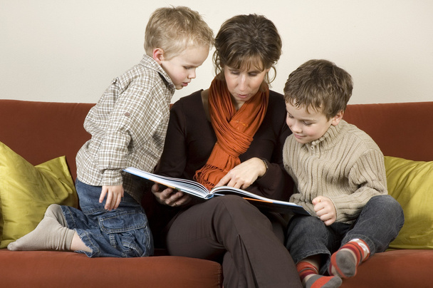 Mother And Two Sons Reading A Book 1 - Photo, Image