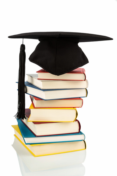 mortarboard on books stack - Photo, Image