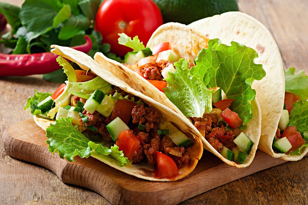 Tortilla wraps with meat and fresh vegetables - Photo, image