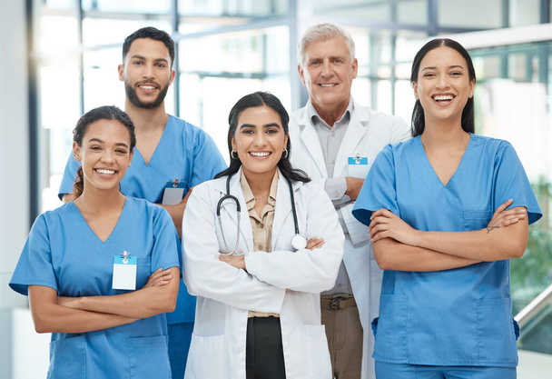 Multidisciplinary care is an integrated team approach to healthcare. a group of medical practitioners standing together in a hospital - Photo, image