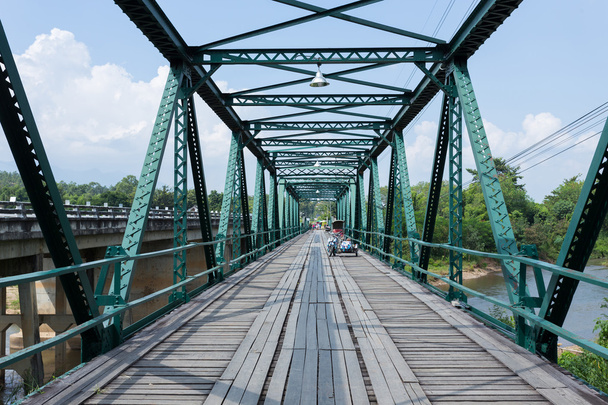 iron bridge at pai river in thailand - Photo, Image