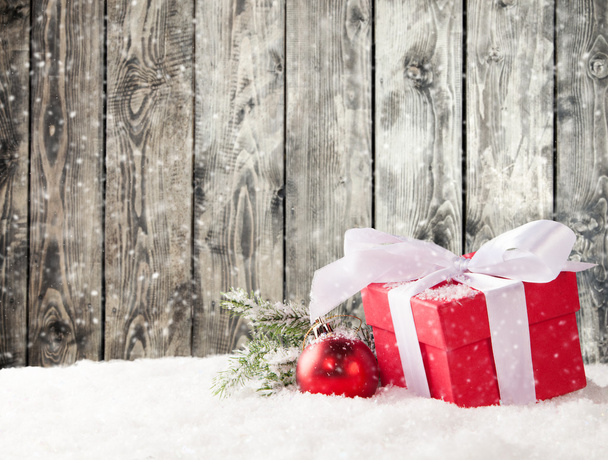 Christmas gifts in snow - Foto, imagen