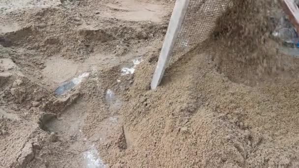 construction wooden frame sifter for finer sand. - Footage, Video